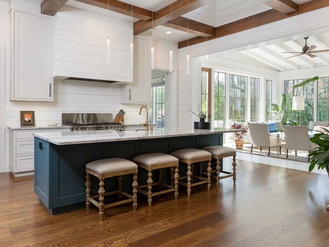 Blue beauty kitchen island with stools